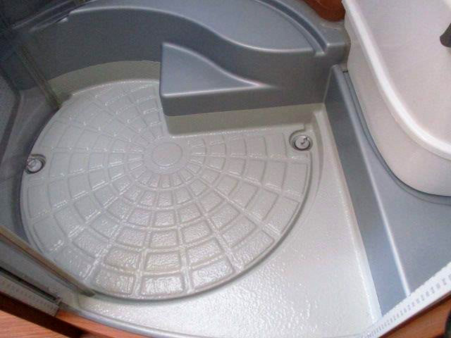 Shower floor repair finished with Speedcoat
